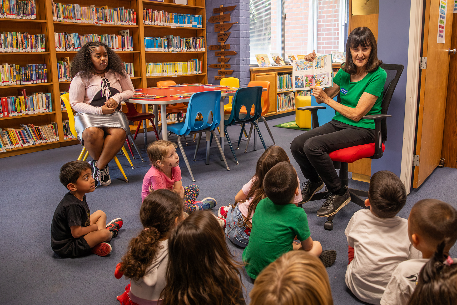 Child holding an open book